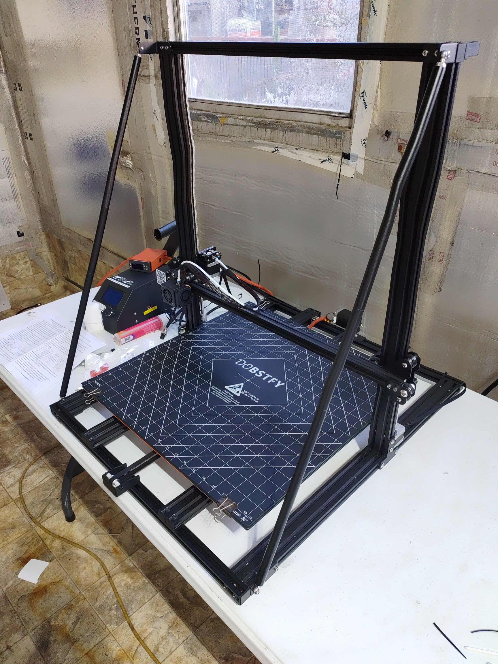 Creality CR-10 S5 large-format 3D printer being modified for production